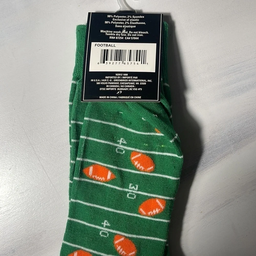 4 pairs of men socks. Football. Top Ramen. Beer. Lemur size 6-12